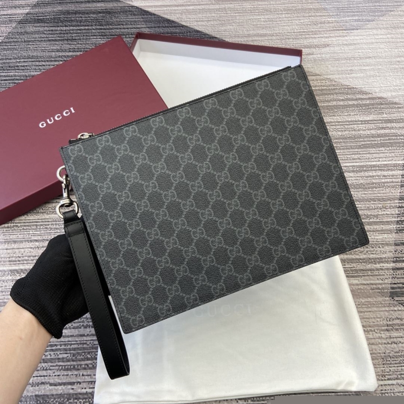 G*u*i clutch bags